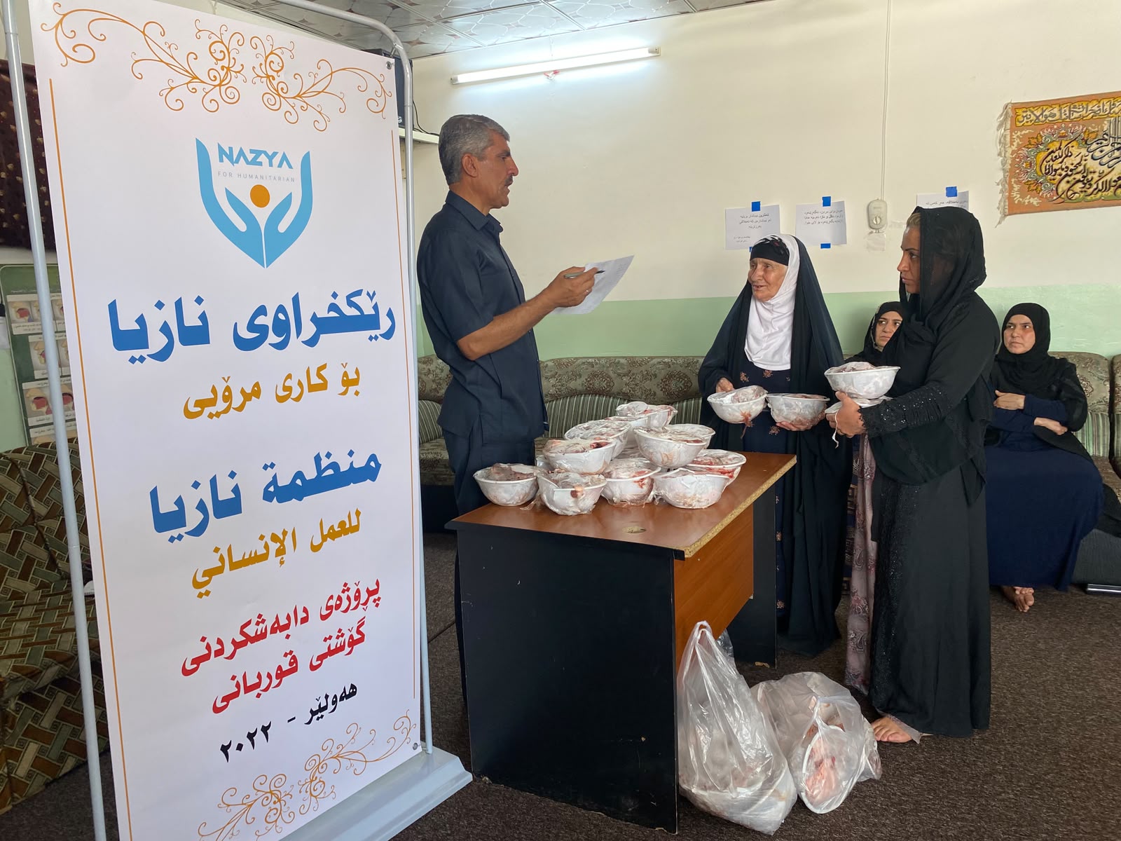 Nazya Organization distributing fresh meat to families during Eid Al-Adha in Kurdistan Region Iraq