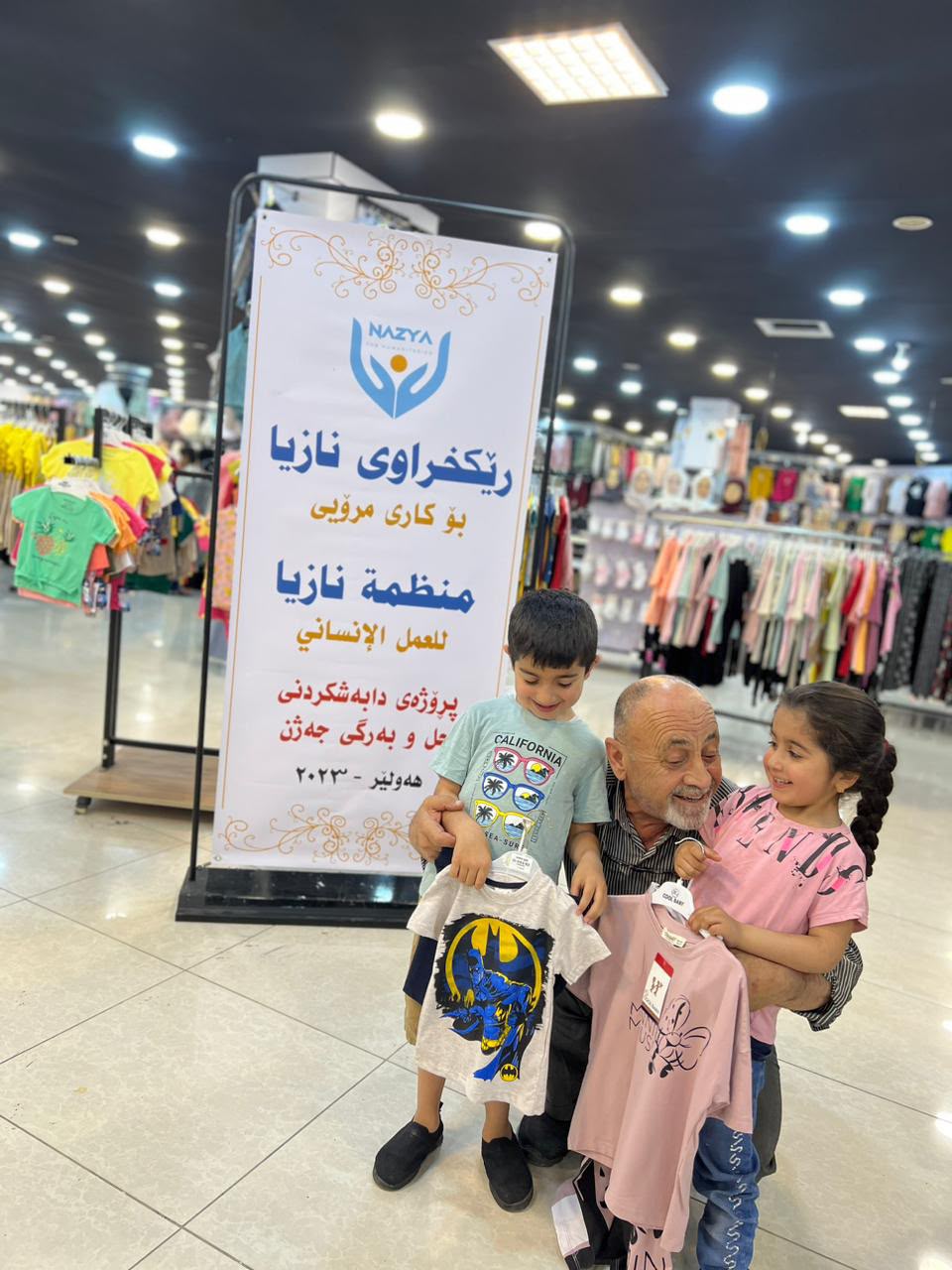 Nazya Humanitarian Aid distributing Eid clothes and gifts to children and families in need in Kurdistan