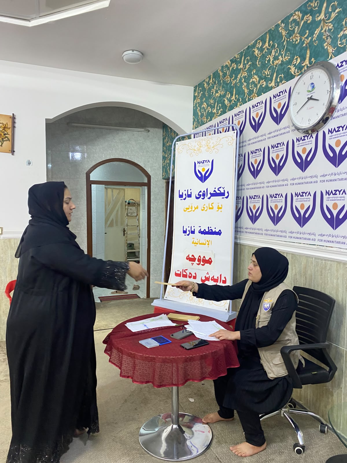 Nazya Humanitarian Aid providing monthly salary support and financial aid to vulnerable families living in poverty in Kurdistan Region
