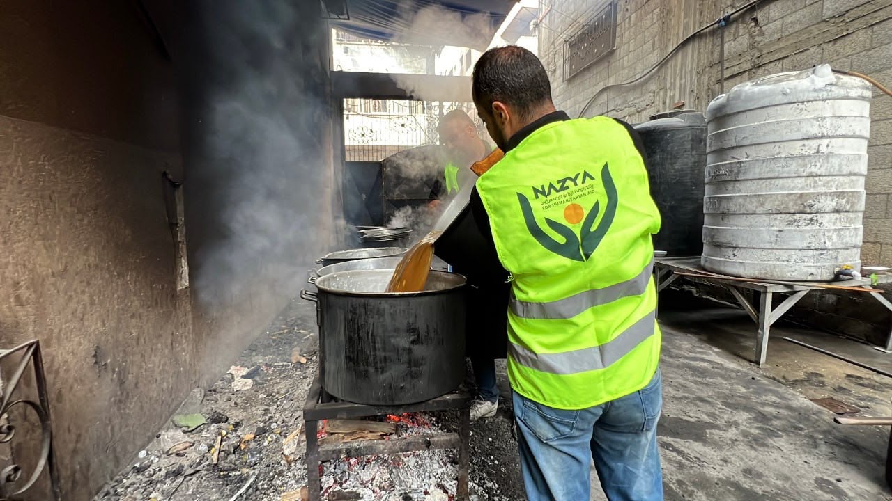 Nazya Humanitarian Aid food aid distribution for Palestinian families | delivering groceries, bread and essential food supplies to people in need in Palestine