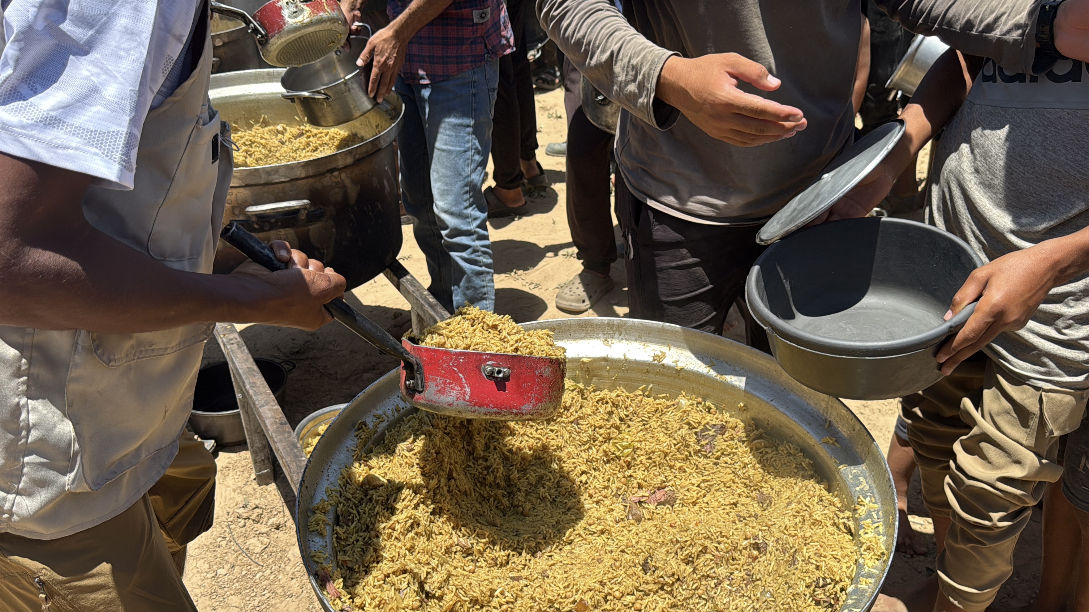 Nazya Humanitarian Aid food aid distribution for Palestinian families | delivering groceries, bread and essential food supplies to people in need in Palestine